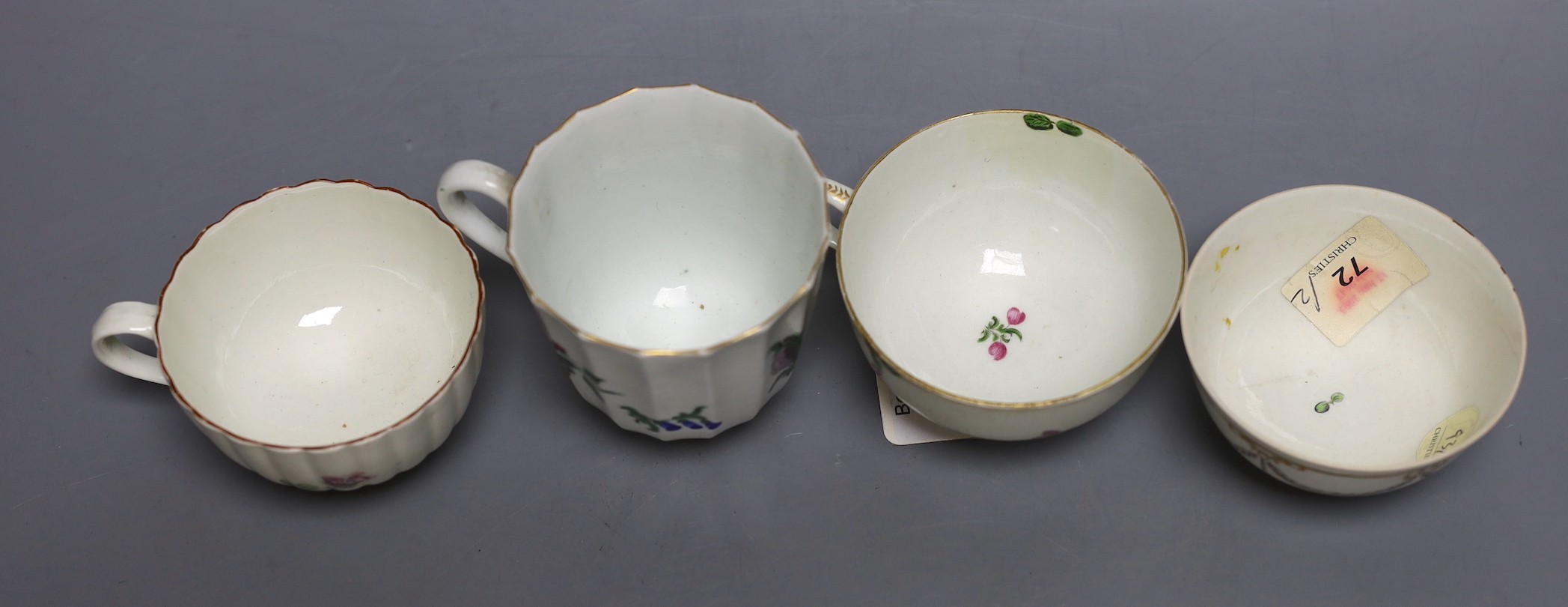 A Worcester tall faceted chocolate cup painted with flowers, a Worcester teacup, purchased Bonhams Zorensky col. part 2 Lot 105, and another Worcester teacup and teabowl